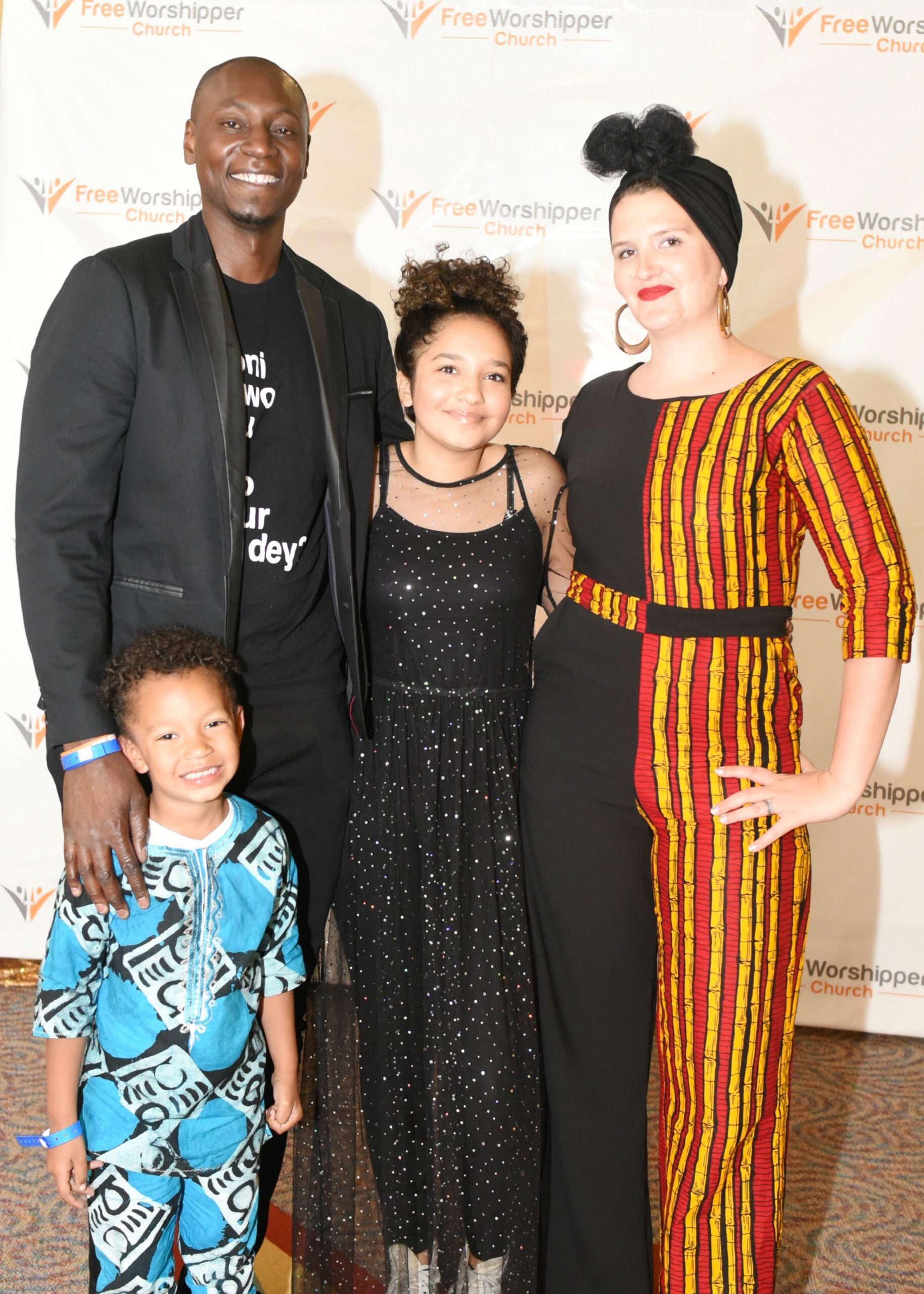 Family posing together at a church event