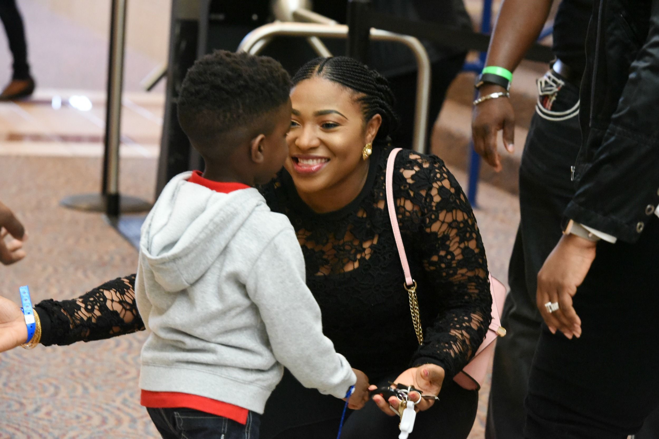 Woman greeting a child at church