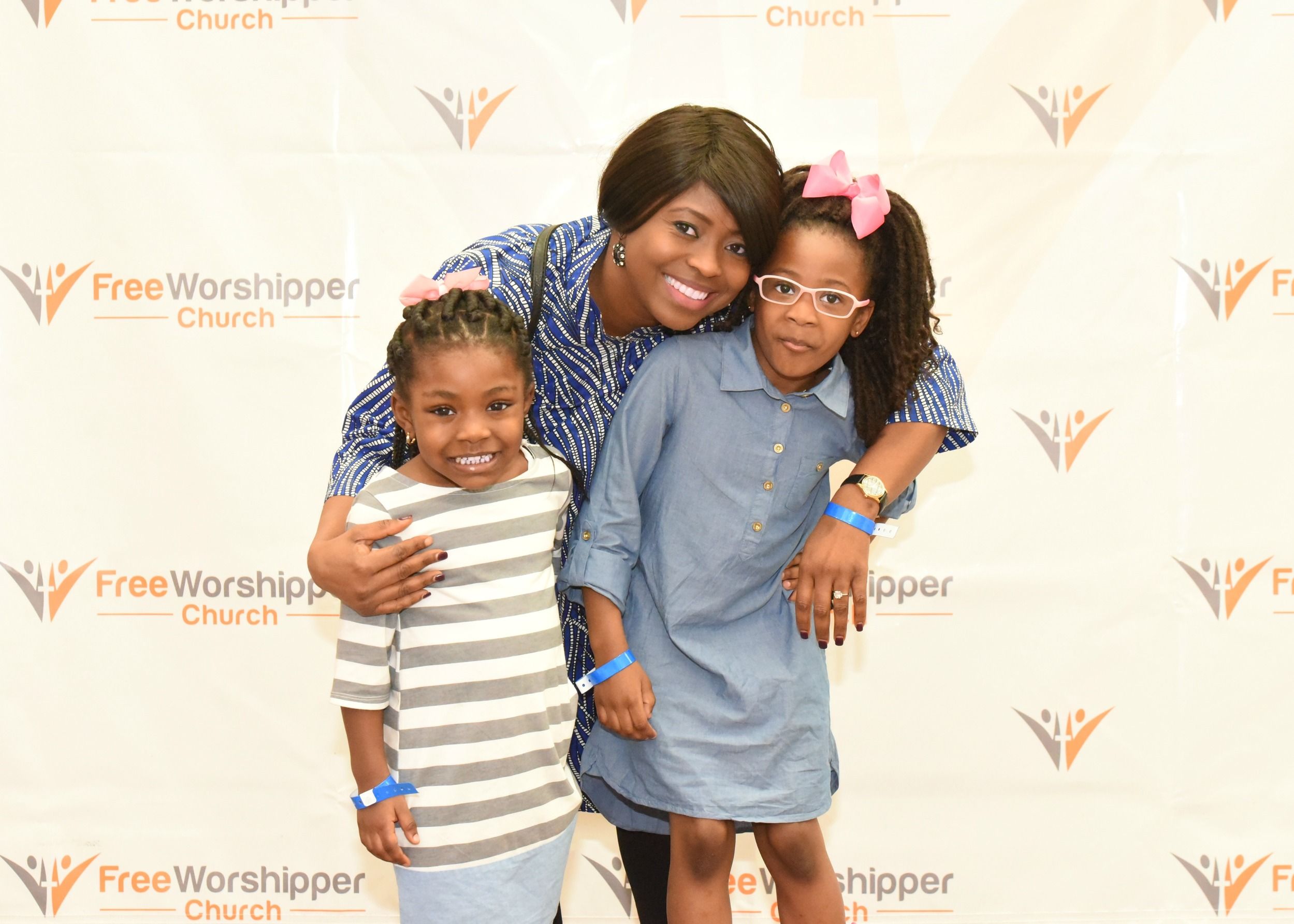 Woman and children posing together at church event